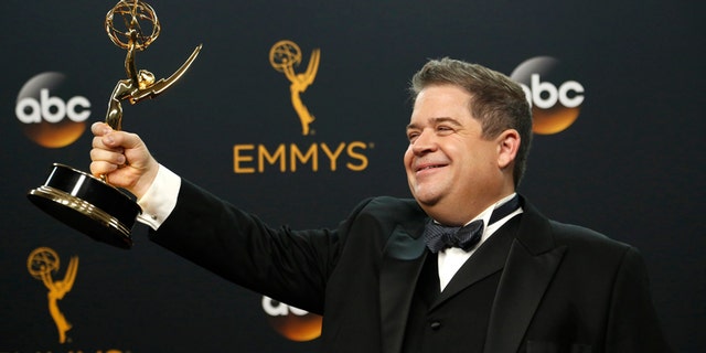 Writer Patton Oswalt poses backstage with his award for Outstanding Writing For A Variety Special for "Patton Oswalt: Talking For Clapping" at the 68th Primetime Emmy Awards in Los Angeles, California U.S., September 18, 2016.