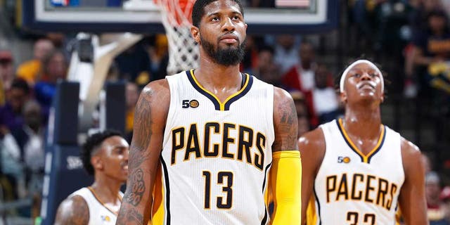 INDIANAPOLIS, IN - APRIL 23: Paul George #13 and Myles Turner #33 of the Indiana Pacers react in the second half of Game Four of the Eastern Conference Quarterfinals during the 2017 NBA Playoffs against the Cleveland Cavaliers at Bankers Life Fieldhouse on April 23, 2017 in Indianapolis, Indiana. The Cavaliers defeated the Pacers 106-102 to sweep the series 4-0. NOTE TO USER: User expressly acknowledges and agrees that, by downloading and or using the photograph, User is consenting to the terms and conditions of the Getty Images License Agreement. (Photo by Joe Robbins/Getty Images)