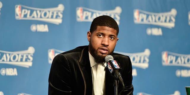 CLEVELAND, OH - APRIL 15: Paul George #13 of the Indiana Pacers speaks to the media after a game against the Cleveland Cavaliers in Round One of the Eastern Conference Playoffs during the 2017 NBA Playoffs on April 15, 2017 at Quicken Loans Arena in Cleveland, Ohio. NOTE TO USER: User expressly acknowledges and agrees that, by downloading and/or using this photograph, user is consenting to the terms and conditions of the Getty Images License Agreement. Mandatory Copyright Notice: Copyright 2017 NBAE (Photo by David Liam Kyle/NBAE via Getty Images)