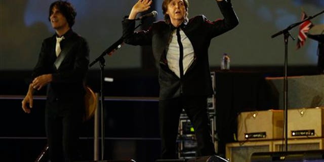 July 28, 2012: Sir Paul McCartney performs during the Opening Ceremony at the 2012 Summer Olympics in London.
