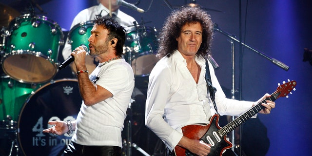 Queen's Brian May (R) and Paul Rodgers (L) perform in Hyde Park, London.