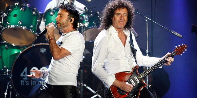 Queen's Brian May (R) and Paul Rodgers (L) perform in Hyde Park, London.