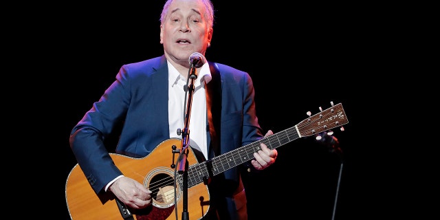 FILE - In a Sept. 22, 2016 file photo, musician Paul Simon performs during the Global Citizen Festival, in New York. On Monday, Feb. 5, 2018, Simon took to social media to say his upcoming tour will be his last, citing the personal toll of touring and the death of his lead guitarist, Vincent N'guini. (AP Photo/Julie Jacobson, File)