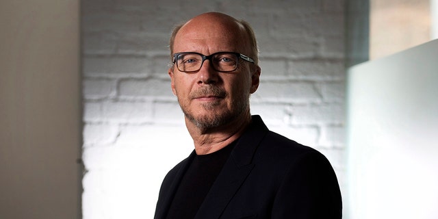 FILE - In this Sept. 6, 204 file photo, director Paul Haggis poses for a photo in Toronto during the 2014 Toronto International Film Festival. A December 2017 civil lawsuit charging the Oscar-winning filmmaker with rape has prompted three other women to come forward with their own accusations, including a publicist who says he forced her to perform oral sex, then raped her. Haggis has denied the allegations in the lawsuit, and when asked about the new accusations, his lawyer said, 