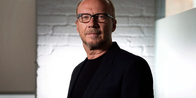 FILE - In this Sept. 6, 204 file photo, director Paul Haggis poses for a photo in Toronto during the 2014 Toronto International Film Festival. A December 2017 civil lawsuit charging the Oscar-winning filmmaker with rape has prompted three other women to come forward with their own accusations, including a publicist who says he forced her to perform oral sex, then raped her. Haggis has denied the allegations in the lawsuit, and when asked about the new accusations, his lawyer said,