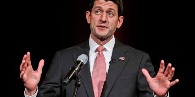 FILE - In this June 6, 2014 file photo, Rep. Paul Ryan, R-Wis., gestures as he speaks during a gala prior to the start of the Virginia GOP Convention in Roanoke, Va. Ryan proposed a new plan Thursday to merge up to 11 anti-poverty programs into a single grant program for states that he said would allow more flexibility to help lift people out of poverty, in a speech to the American Enterprise Institute. (AP Photo/Steve Helber)