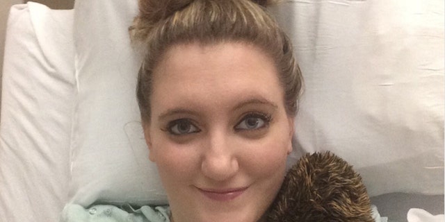 Paxton Webb, 23, is recovering after being paralyzed in an alleged armed robbery.