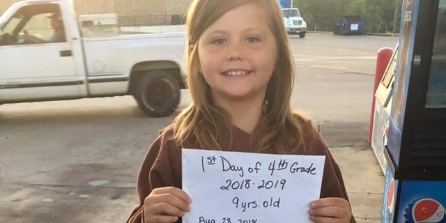 Payton Lynn Crustner, 9, was killed Tuesday in a car collision moments after posing for a first-day-of-school picture, reports said.