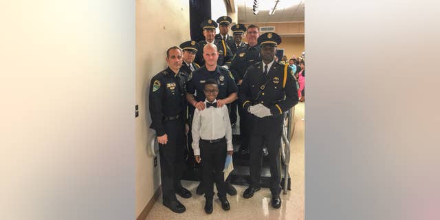Nine of the Joe Crowder's former colleagues attended his son's 5th grade graduation on Friday.