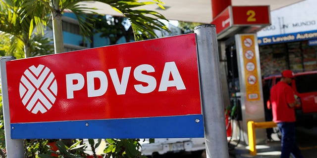The logo of the Venezuelan state oil company PDVSA is seen at a gas station in Caracas, Venezuela March 2, 2017. Picture taken March 2, 2017. To match Insight VENEZUELA-INDIA/OIL REUTERS/Carlos Garcia Rawlins - RTS11WC0