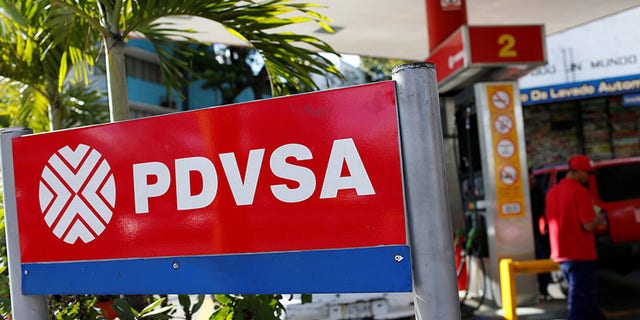 The logo of the Venezuelan state oil company PDVSA is seen at a gas station in Caracas, Venezuela March 2, 2017. Picture taken March 2, 2017. To match Insight VENEZUELA-INDIA/OIL REUTERS/Carlos Garcia Rawlins - RTS11WC0