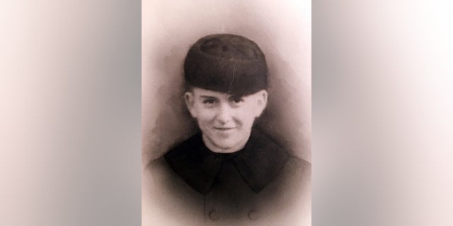 This undated photo provided by the family of Navy Fireman 3rd Class Edwin Hopkins of Keene, N.H., shows Hopkins in his uniform.