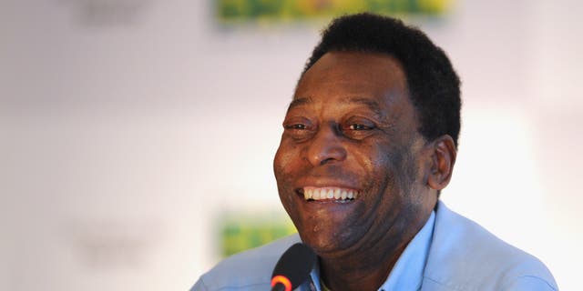 Pelé speaks to the media during his official presentation as honorary ambassador for the 2014 FIFA World Cup at the Modern Art Museum of Rio de Janeiro July 29, 2011, in Rio de Janeiro, Brazil. 