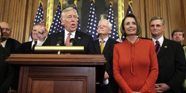 House Majority Leader Steny Hoyer speaks next to Speaker Nancy Pelosi at a news conference on Capitol Hill Nov. 7. (Reuters Photo)