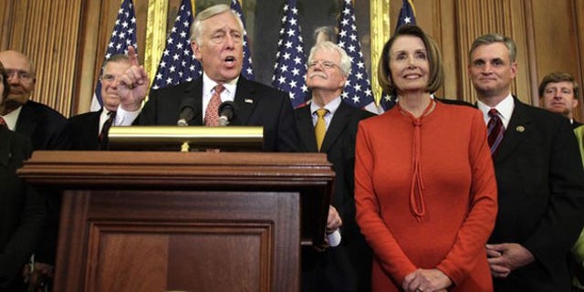 House Majority Leader Steny Hoyer speaks next to Speaker Nancy Pelosi at a news conference on Capitol Hill Nov. 7. (Reuters Photo)
