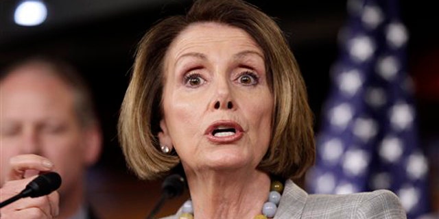 House Minority Leader Nancy Pelosi speaks to reporters June 16 on Capitol Hill in Washington.