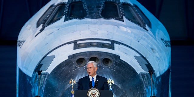 Vice President Mike Pence delivers opening remarks during the National Space Council's first meeting on Oct. 5, 2017 at the Smithsonian National Air and Space Museum's Steven F. Udvar-Hazy Center in Chantilly, Va.