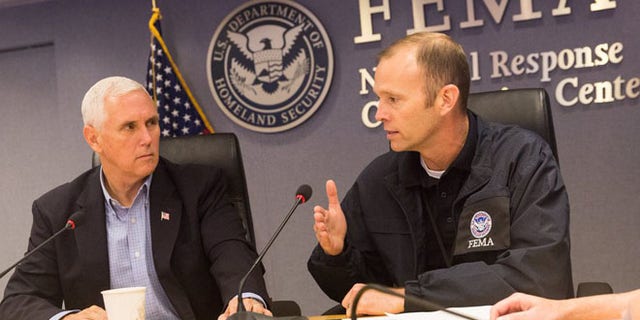Vice President Mike Pence meets with FEMA Administrator Brock Long at the agency's headquarters Saturday.