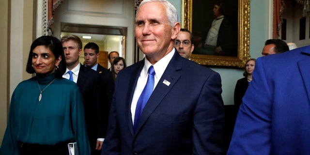 Vice President Mike Pence leaves a meeting with Republican senators, Tuesday, Sept. 19, 2017, on Capitol Hill in Washington. (AP Photo/Jacquelyn Martin)