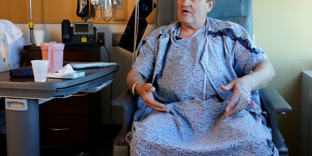 Thomas Manning, of Halifax, Mass. speaks from his hospital room at Massachusetts General Hospital, Wednesday, May 18, 2016, in Boston. Manning is the first man in the United States to undergo a penis transplant. He received the organ from a deceased donor. (AP Photo/Elise Amendola)