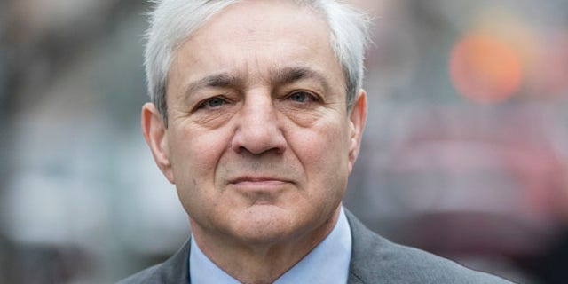 Former Penn State president Graham Spanier walks to the Dauphin County Courthouse in Harrisburg, Pa., Friday, March 24, 2017. Spanier faces charges that he failed to report suspected child sex abuse in the last remaining criminal case in the Jerry Sandusky child molestation scandal. (AP Photo/Matt Rourke)