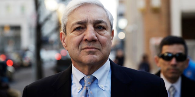 Former Penn State president Graham Spanier walks to the Dauphin County Courthouse in Harrisburg, Pa., Monday, March 20, 2017.