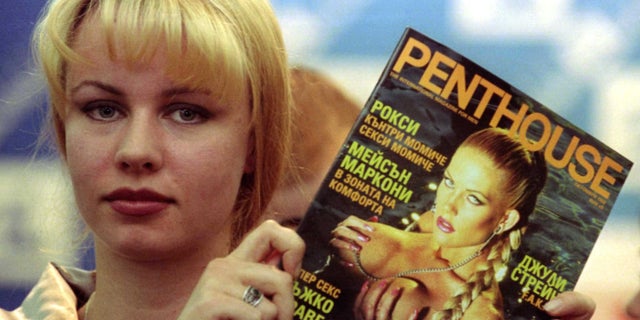 A model poses with the first issue of the Bulgarian edition of Penthouse monthly magazine in Sofia September 17. This is the first international erotic magazine to be issued in the Balkan state after the collapse of communism in 1989. Dozens of local pornographic magazines have hit the newsstands since then.EK/ME - RTRHD9D