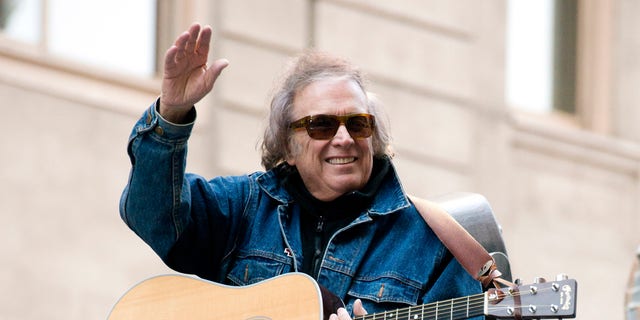 FILE - In this Nov. 22, 2012 file photo, Don McLean rides a float in the Macy's Thanksgiving Day Parade in New York. McLean and his wife have finalized their divorce and agreed to a $10 million settlement.A spokesman for McLean said Monday, June 20, 2016, that the singer chose to ignore a premarital agreement and provide the settlement.  (AP Photo/Charles Sykes, File)