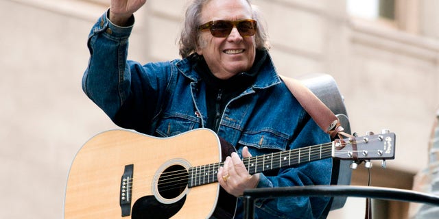 FILE - In this Nov. 22, 2012 file photo, Don McLean rides a float in the Macy's Thanksgiving Day Parade in New York. McLean and his wife have finalized their divorce and agreed to a $10 million settlement.A spokesman for McLean said Monday, June 20, 2016, that the singer chose to ignore a premarital agreement and provide the settlement. (AP Photo/Charles Sykes, File)