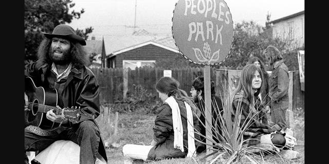 A group gathered in People's Park in the 1970s.