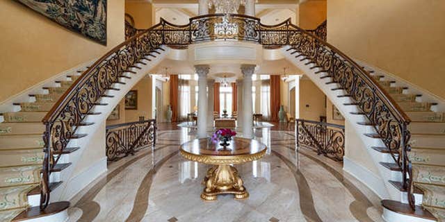 The lavish mansion inspired by France’s Palace of Versailles—and featuring indoor and outdoor pools plus an underground ballroom—hit the market on Thursday.