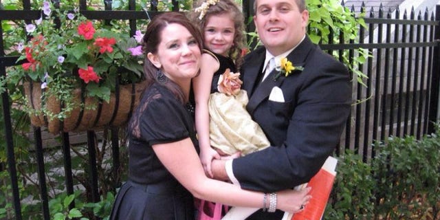 Amee and Chris Banks pose with their daughter, Persephonee, who died Thursday of a rare strep infection.