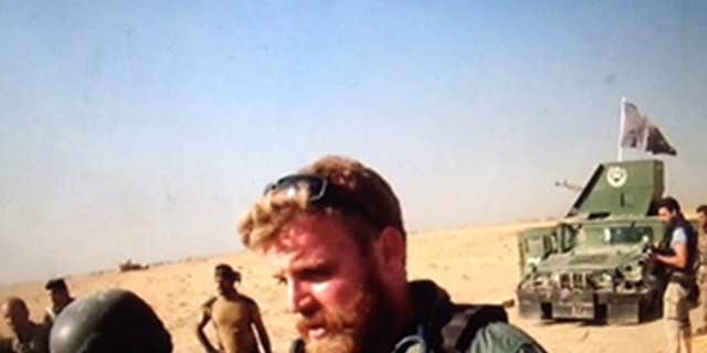 Combat medic Reed north of Mosul on anti-ISIS front line.