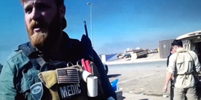 Volunteer Combat Medic Peter Reed just outside Mosul, Iraq.
