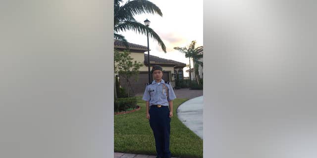 Peter Wang dressed in a JROTC uniform.