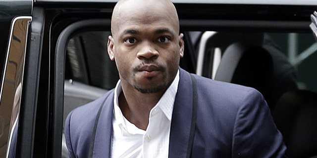 Dec. 2, 2014: Minnesota Vikings' Adrian Peterson arrives for a hearing for the appeal of his suspension in New York. (AP)