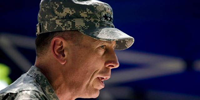 Gen. David Petraeus, the new commander of U.S. and NATO forces in Afghanistan, speaks during a ceremony July 4 in Kabul. (AP Photo)