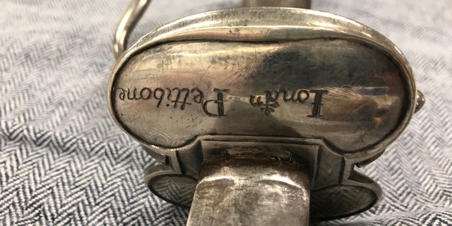 Inscription of Pettibone's name on the sword (Museum of the American Revolution)