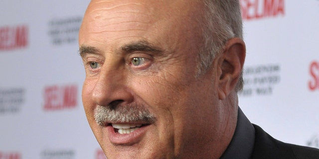 TV personality Phil McGraw arrives during a gala event for the film "Selma" in Goleta, California December 6, 2014.