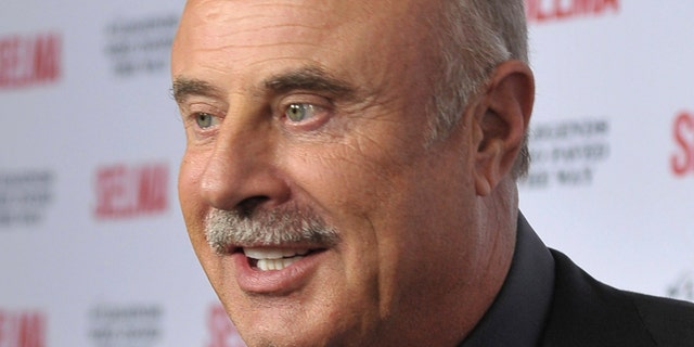 TV personality Phil McGraw arrives during a gala event for the film "Selma" in Goleta, California December 6, 2014.