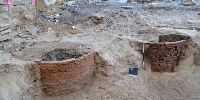 Two privies during the excavation. “The Success to the Tryphena” punch bowl came from the one on the right. (Commonwealth Heritage Group)