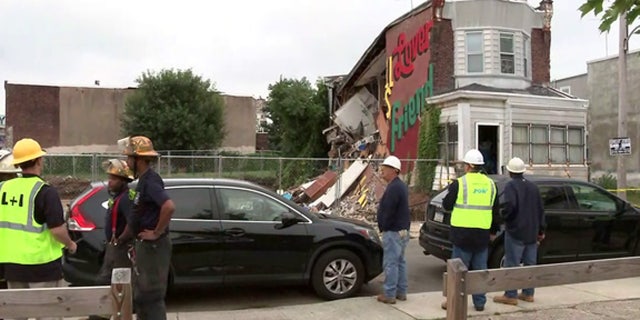 The scene after a row home partially collapsed in Philadelphia.