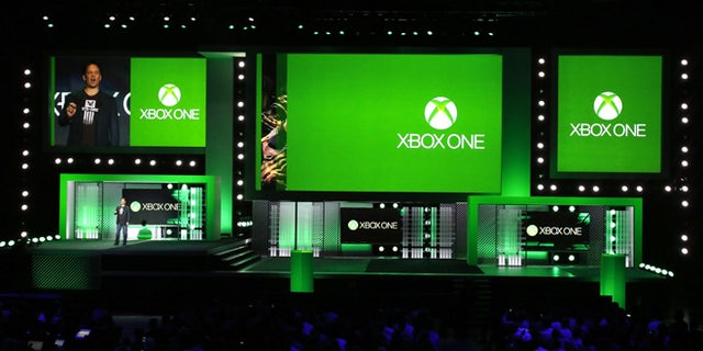 Phil Spencer, corporate vice president of Microsoft Studios, speaks during the Xbox E3 Media Briefing at USC's Galen Center in Los Angeles, California. He later released a statement apologizing for an offensive comment one employee made towards another during a 'Killer instinct' demonstration.