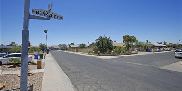 Near this block of West Berkeley Road in the Maryvale section of Phoenix, three persons died in one of a rash of shootings, shown here during the day Friday, July 8, 2016.