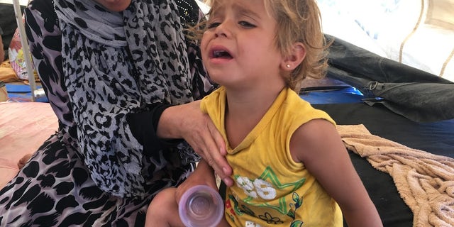 A child weeps at Arisha camp in Hassakeh governorate.