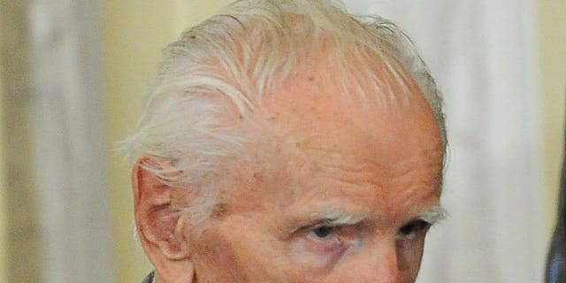 File picture shows top Nazi war crimes suspect Laszlo Csatari, aka Laszlo Csizsik-Csatari, leaving a courthouse in Budapest on July 18, 2012. Csatari, accused of overseeing thousands of Jewish deportations during World War II, was charged with war crimes on Tuesday in Hungary, prosecutors said.