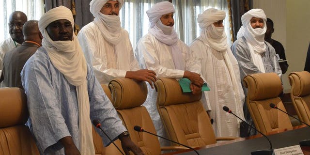 Tuareg delegates arrive to meet a Mali government delegation in Ougadougou, Burkina Faso, last week. Bamako will sign a deal with Tuareg rebels on Tuesday that is expected to pave the way for nationwide polls next month, a Mali government envoy told AFP.