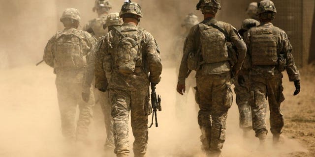 File photo shows US army soldiers leaving on a patrol from Combat Outpost Nolen in the village of Jellawar in the Arghandab Valley, Afghanistan on September 5, 2010. The United States on Tuesday welcomed the Taliban's decision to open an office in Qatar and senior US officials said they hoped to meet with their Afghan foes within days.