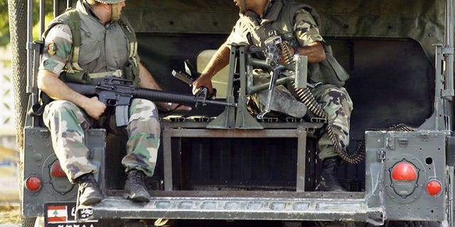Lebanese soldiers deploy in Sidon's Abra suburb on Tuesday after a shooting spree by Salafist gunmen. The shooting by gunmen loyal to a controversial sheikh left one man dead and several wounded, the army and a security source said.