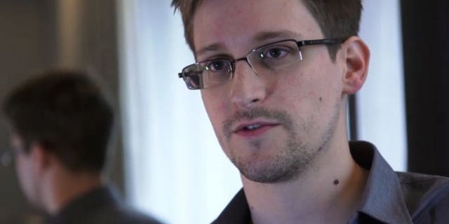 This still frame grab released to AFP on June 10, 2013 shows Edward Snowden speaking during an interview with The Guardian newspaper at an undisclosed location in Hong Kong. Iceland said Wednesday it has held informal talks with an intermediary of US intelligence leaker Snowden who reportedly may want to seek political asylum there.